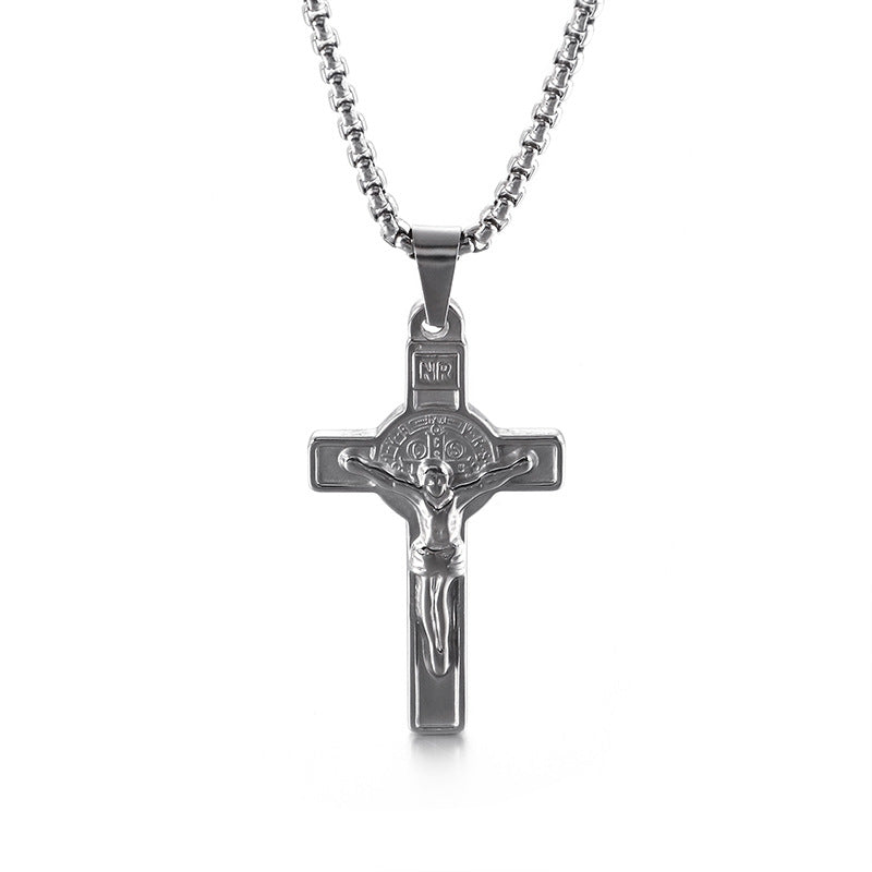 Close-up view of titanium steel cross pendant showcasing clean casting detail