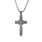 Close-up view of titanium steel cross pendant showcasing clean casting detail