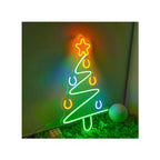 Christmas tree neon sign glowing on wooden surface with decorative ribbon