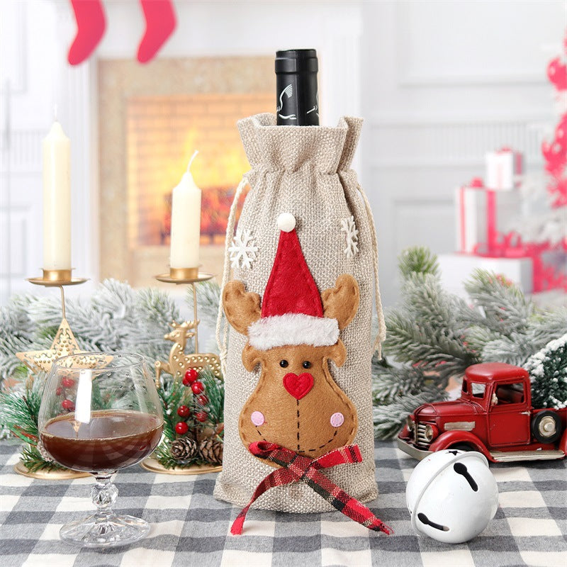 Holiday wine bottle bag featuring classic Santa Claus head design