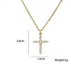 Cubic Zirconia Stones on Gold Cross Necklace detail