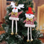 Festive window hanging with Santa and snowman pendants on strings
