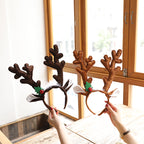 Festive Christmas headband with deer antlers close-up view