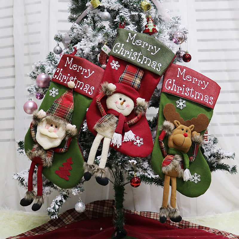Festive Christmas stockings arranged by fireplace mantel as traditional holiday decoration with warm faith atmosphere