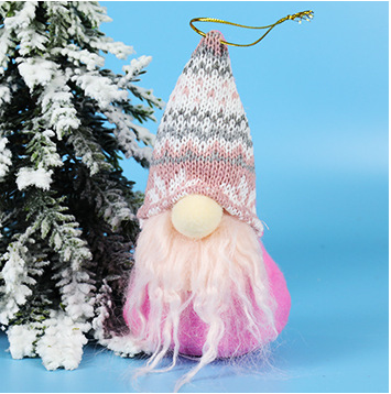 Set of plush Christmas old man figures in pink and grey for holiday decor