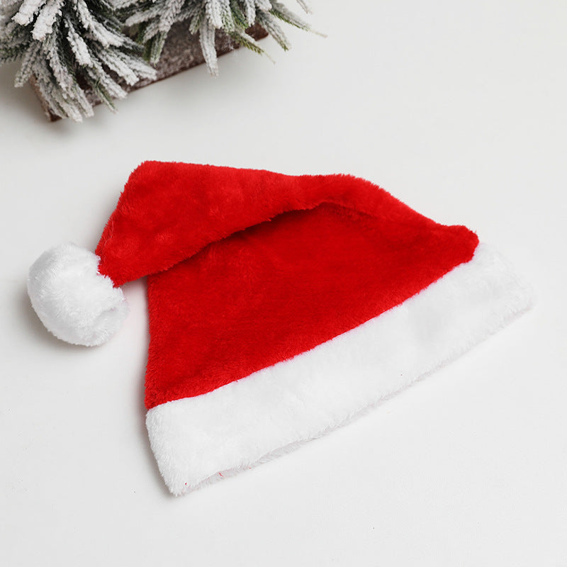 Velvet Santa hat adding warmth to Christmas decor