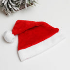 Velvet Santa hat adding warmth to Christmas decor