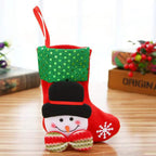 Set of festive Christmas stocking gift bags in various seasonal designs