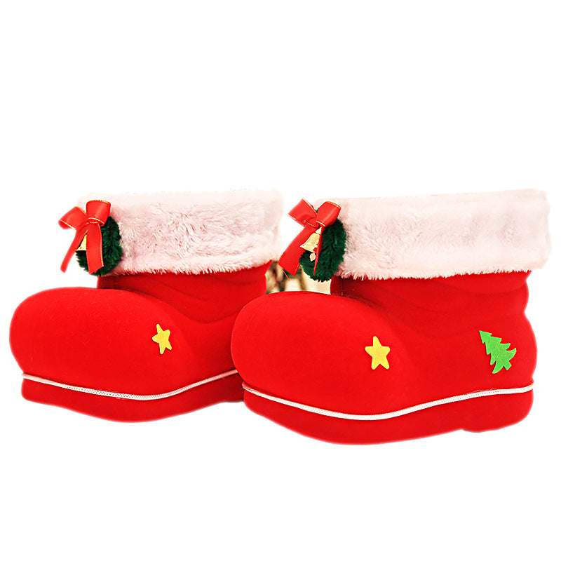 Christmas candy boot filled with holiday treats and decorations