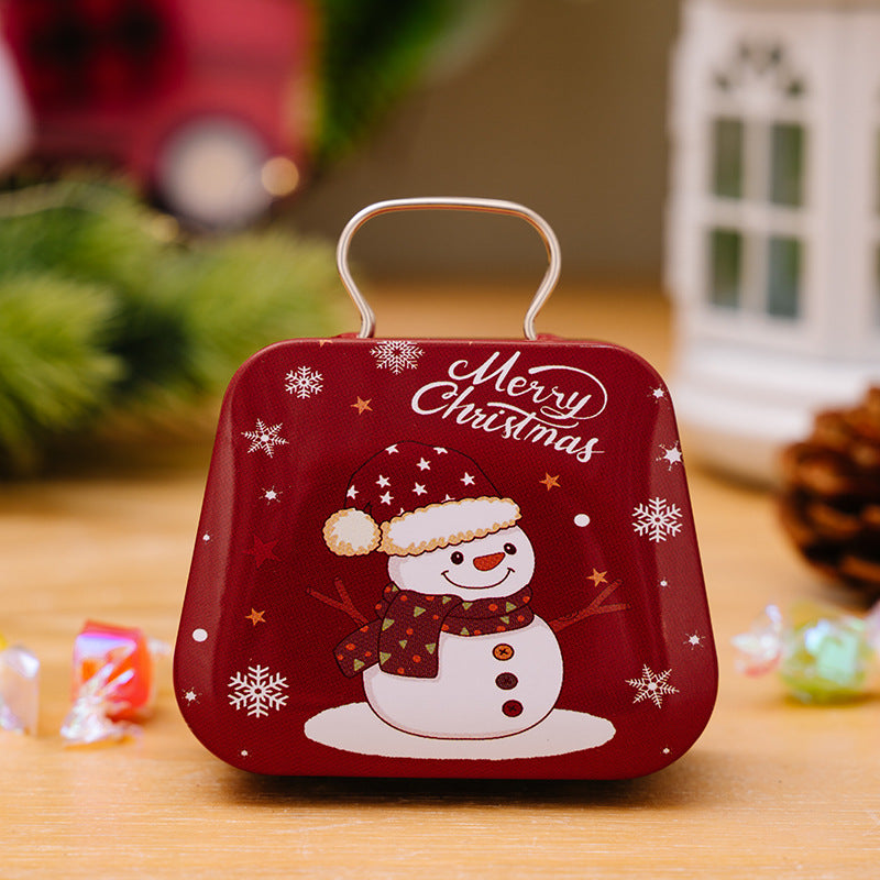 Close-up of decorative tinplate handbag candy box design