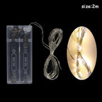 Packaging showing 20 LED Christmas string lights with festive holiday designs