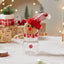 Red hat gingerbread man pendant ornament on festive background