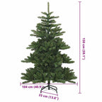Artificial Christmas tree placed in a sheltered outdoor setting for holiday display