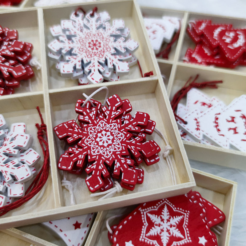 Close-up of wooden Christmas pendant with red and white festive finish