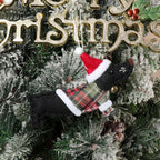 Whimsical dressed dog pendant capturing the faithful companion spirit of Christmas