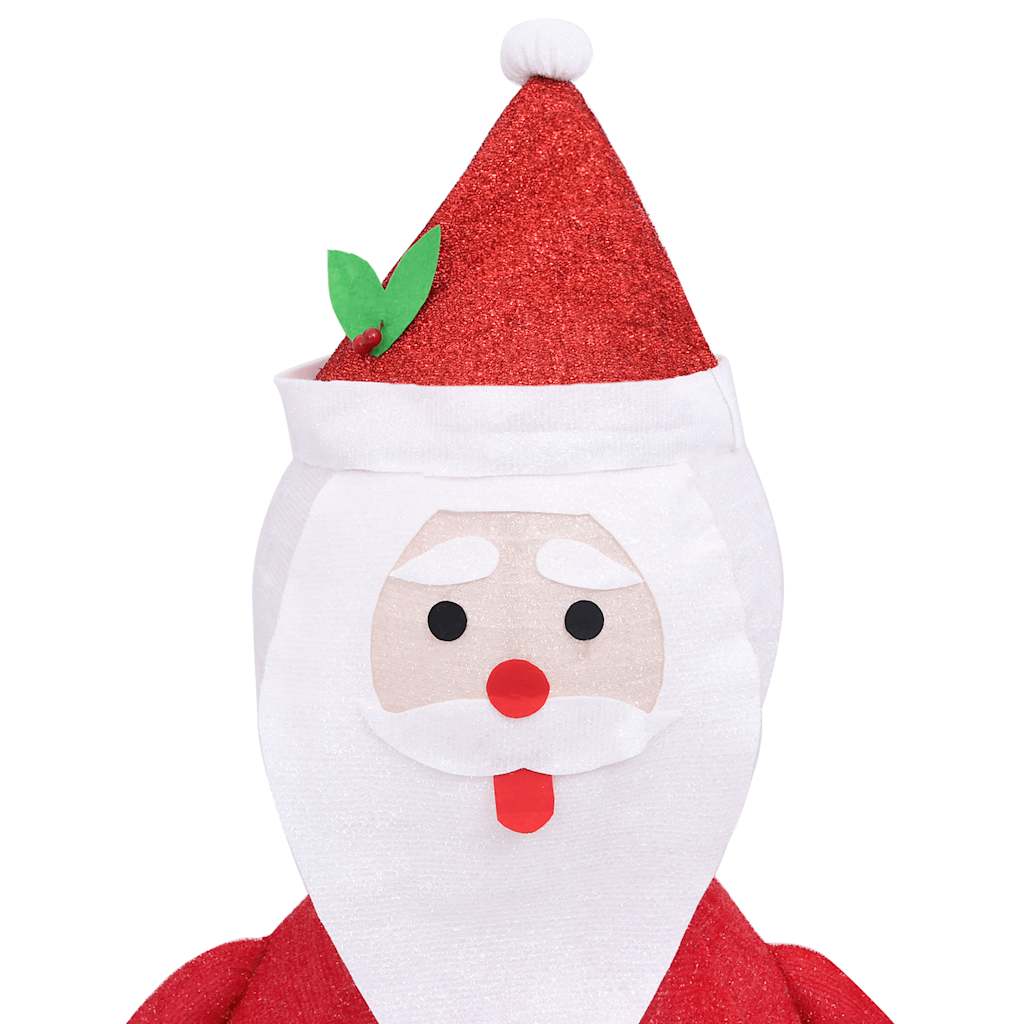 Close-up of LED Santa face with red fabric and warm lighting effects