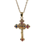 Two pendant styles side by side showing distinct cross designs