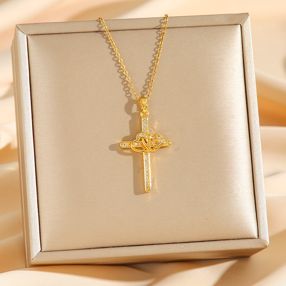 Gold cross heart zircon pendant necklace on a chain