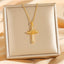 Gold cross heart zircon pendant necklace on a chain