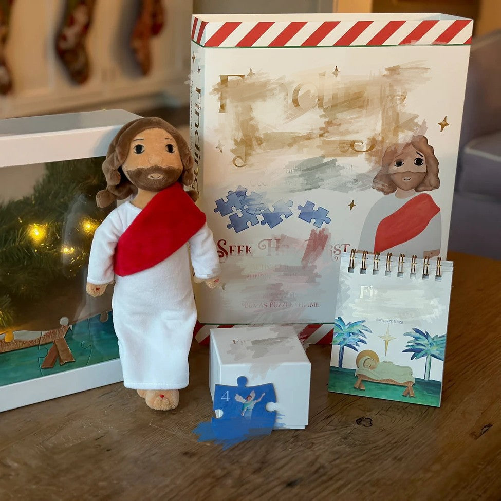 Finding God paper ornament placed near a Bible and candle for Advent reflection, Christian home decor