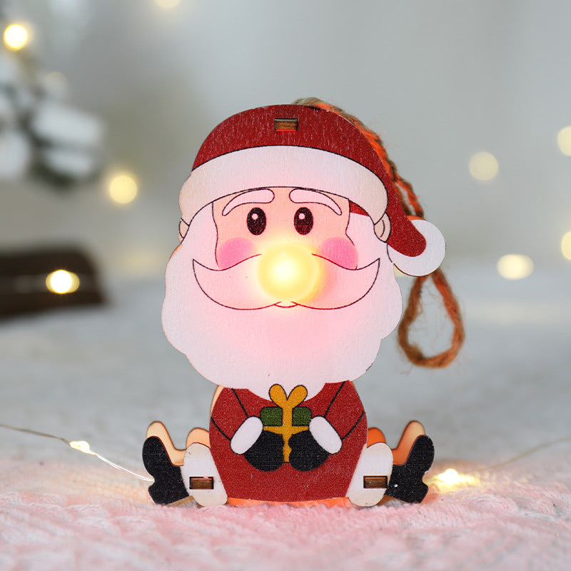 Wooden Christmas ornament featuring red-nosed snowman