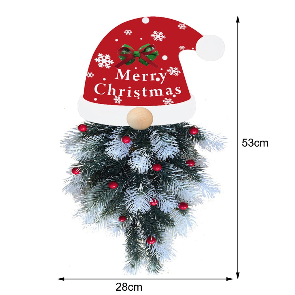Pine branch garland pendant decoration hanging on Christmas tree with warm lighting and faith ambiance