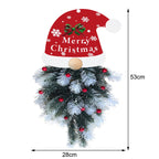Pine branch garland pendant decoration hanging on Christmas tree with warm lighting and faith ambiance