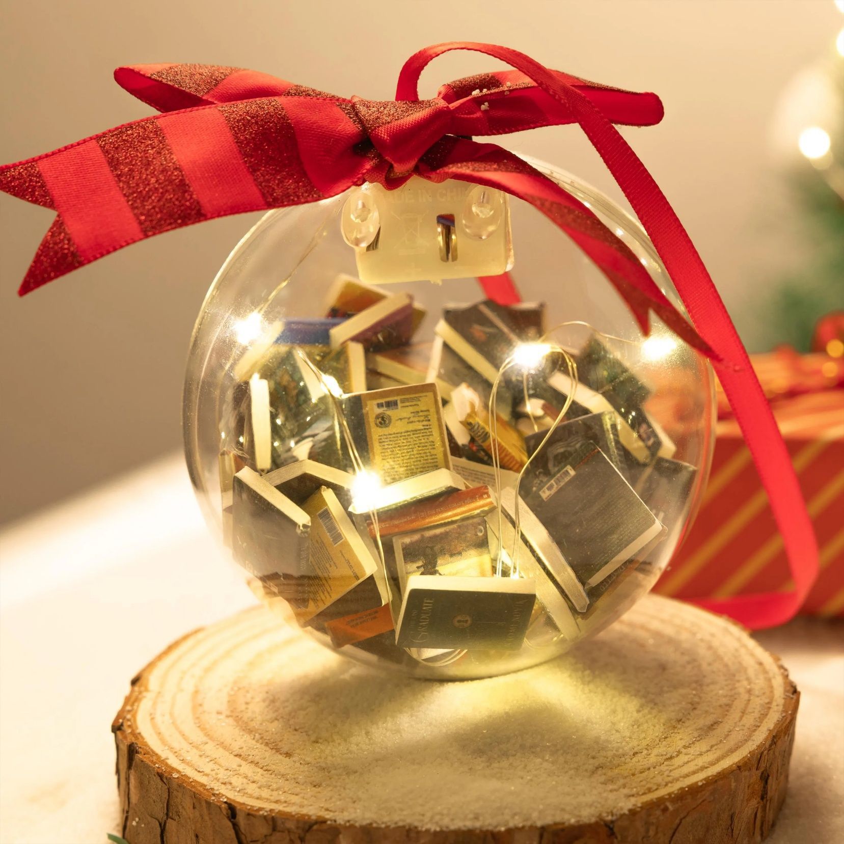 Holiday ball ornament celebrating literature and Christmas spirit