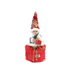 Cartoon Santa Claus ornament with rosy cheeks standing cheerfully for Christmas decor