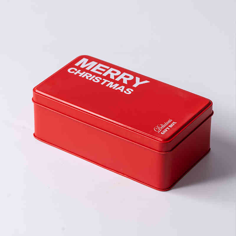 Close-up of Merry Christmas text on red tinplate cookie box