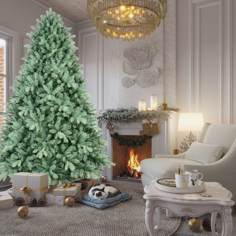 Full view of a decorated green Christmas tree with mixed PE/PVC branches
