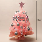 White mini Christmas tree 60cm displayed on wooden surface with ornaments