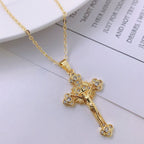 Close-up detail of the copper cross pendant and chain clasp