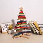 Holiday desktop scene with Christmas building block ornament and seasonal accents