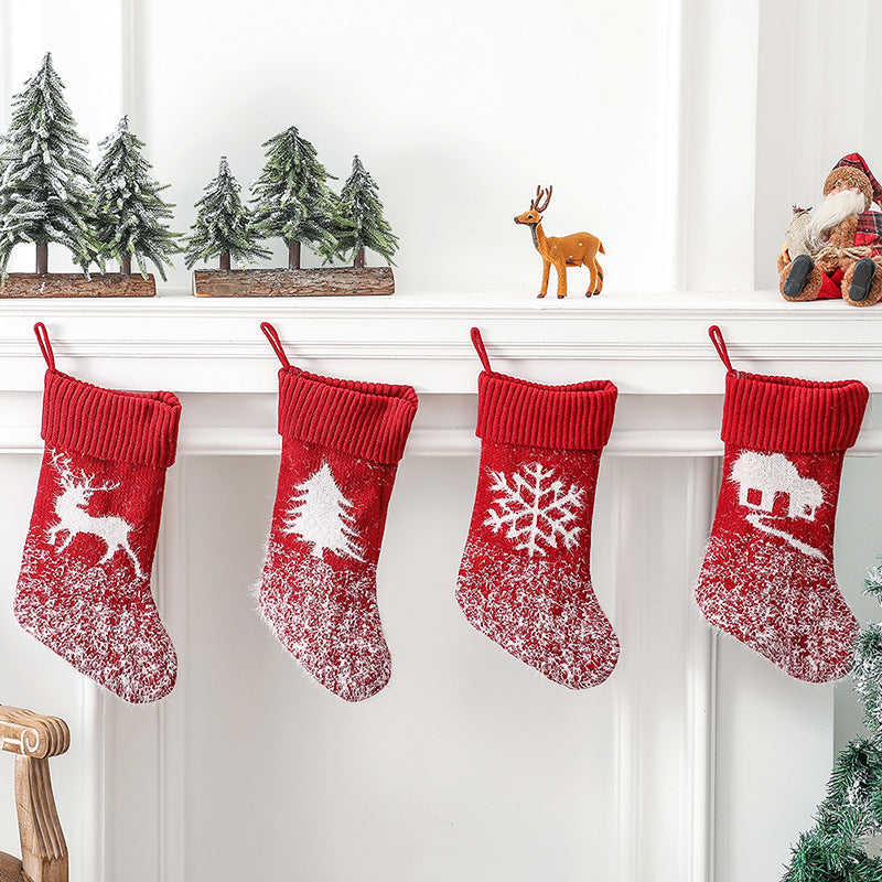 Hanging decorative Christmas stocking with festive patterns