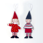 Close-up of wooden Christmas ornament with printed boy design