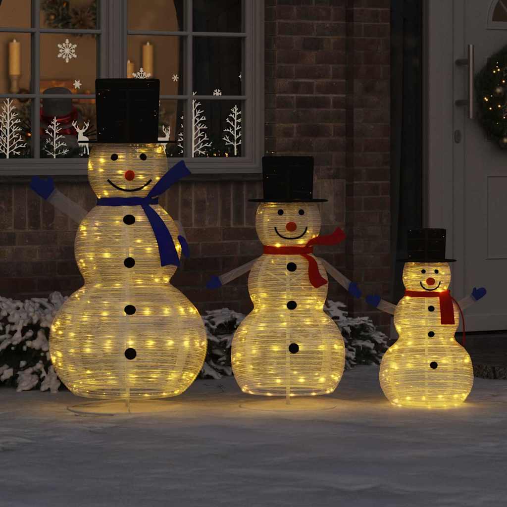 Lighted snowman family decoration with warm white glow