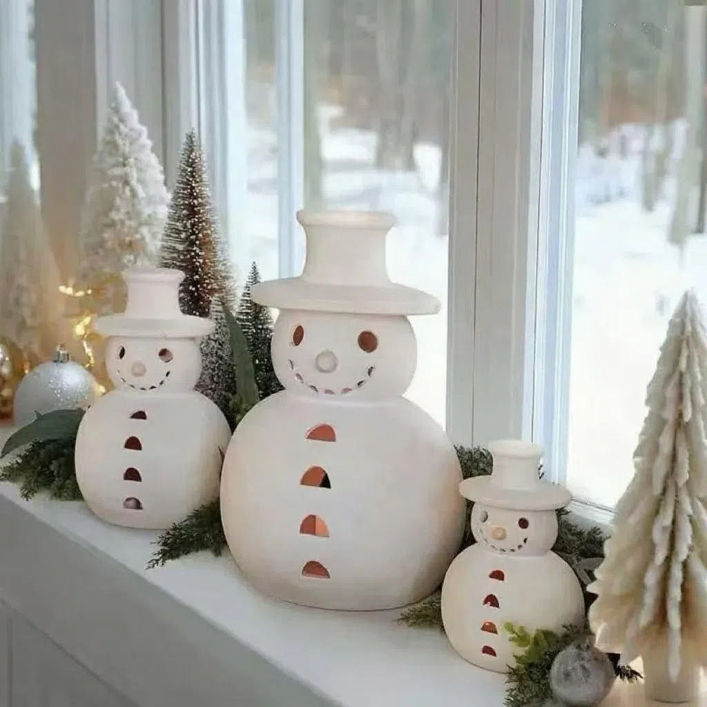 Close-up view of small retro snowman resin ornament with classic holiday charm