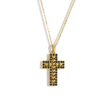 Gold-tone stainless steel cross pendant necklace with chain on light background