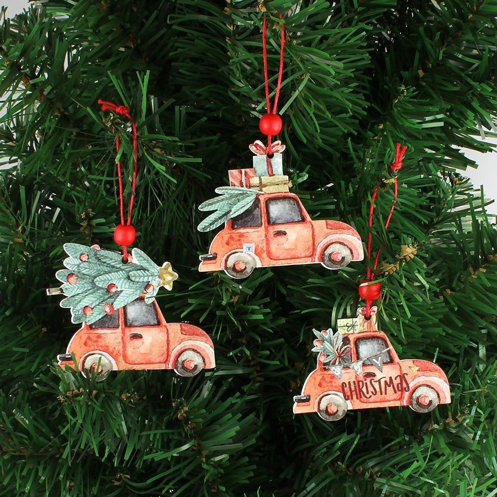 Three wooden pendant ornaments showing vintage Christmas truck and tree designs