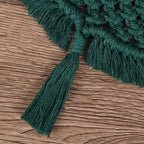 Hand-woven green cotton string Christmas tree pendant hanging on a tree
