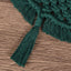 Hand-woven green cotton string Christmas tree pendant hanging on a tree