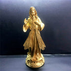 Compact resin religious sculpture suitable for mantel or shelf display
