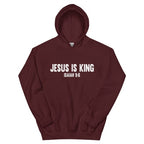 Teen in Jesus Is King hoodie smiling outdoors