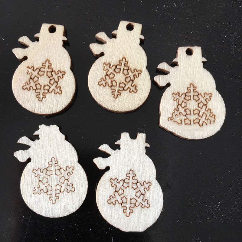 Christmas wood pendant with ribbon hanger detail