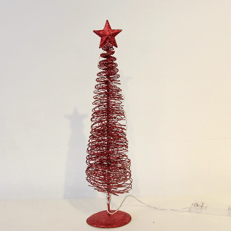 Elegant Christmas decoration with gentle illumination in red and gold