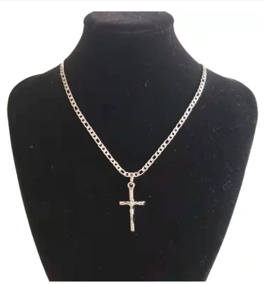 Cross pendant detail showing 2.0x3.8cm proportions and polished finish