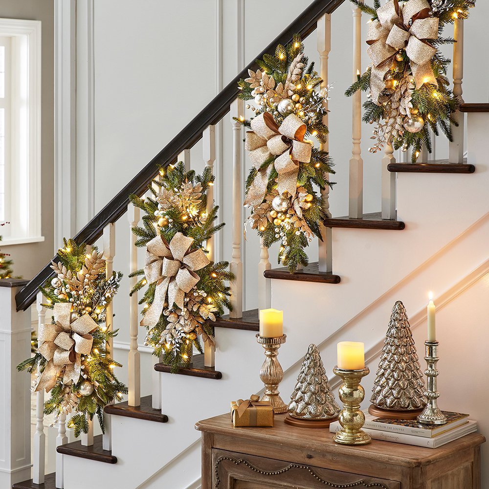 Close-up view of illuminated upside down Christmas tree door hanging