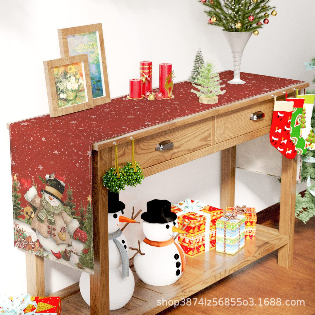 Christmas snowman table runner laid out on dining table for holiday gatherings