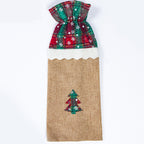 Set of four Christmas wine bottle bag designs including tree and star patterns